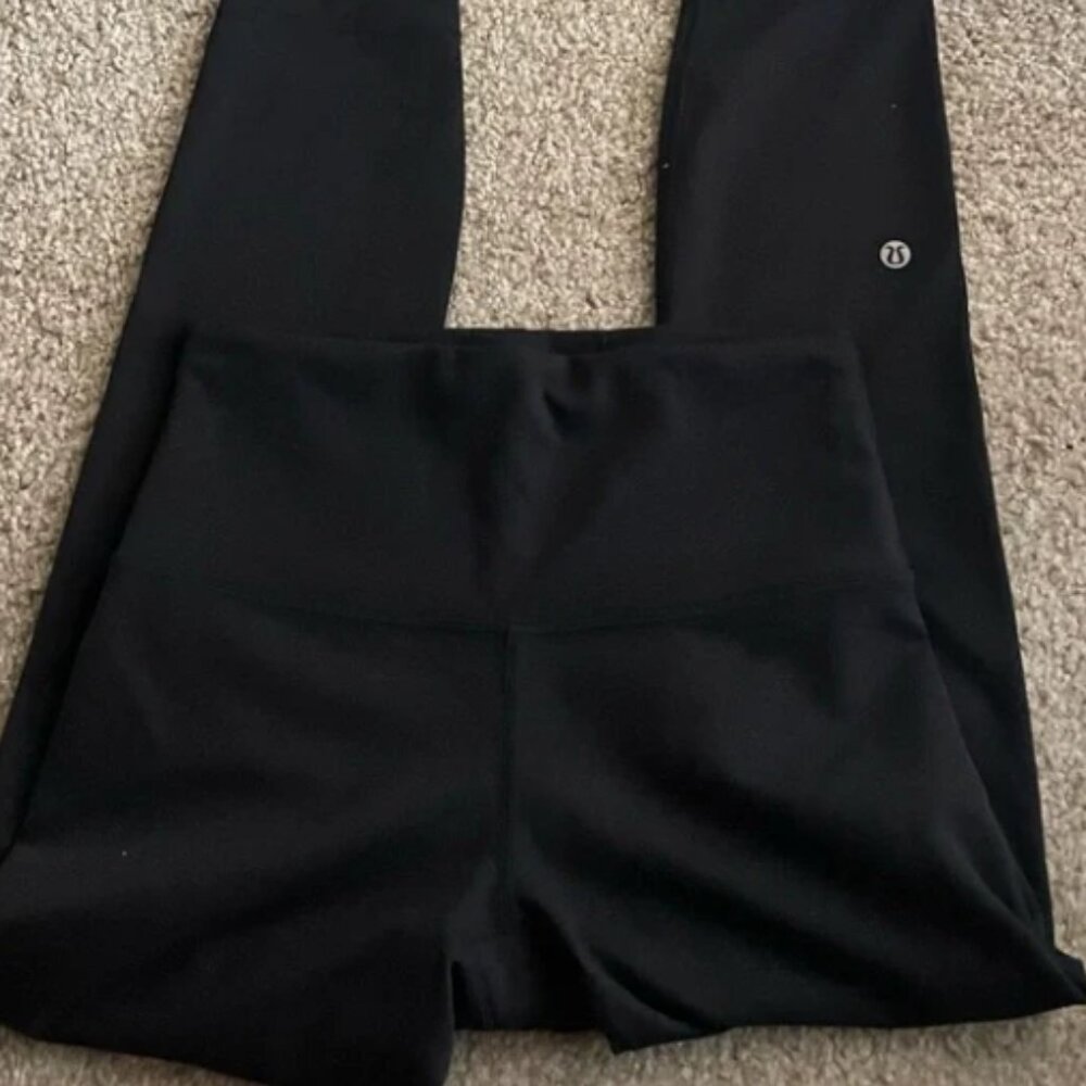 Lululemon wonder train high rise tight 25" black legging- size 4